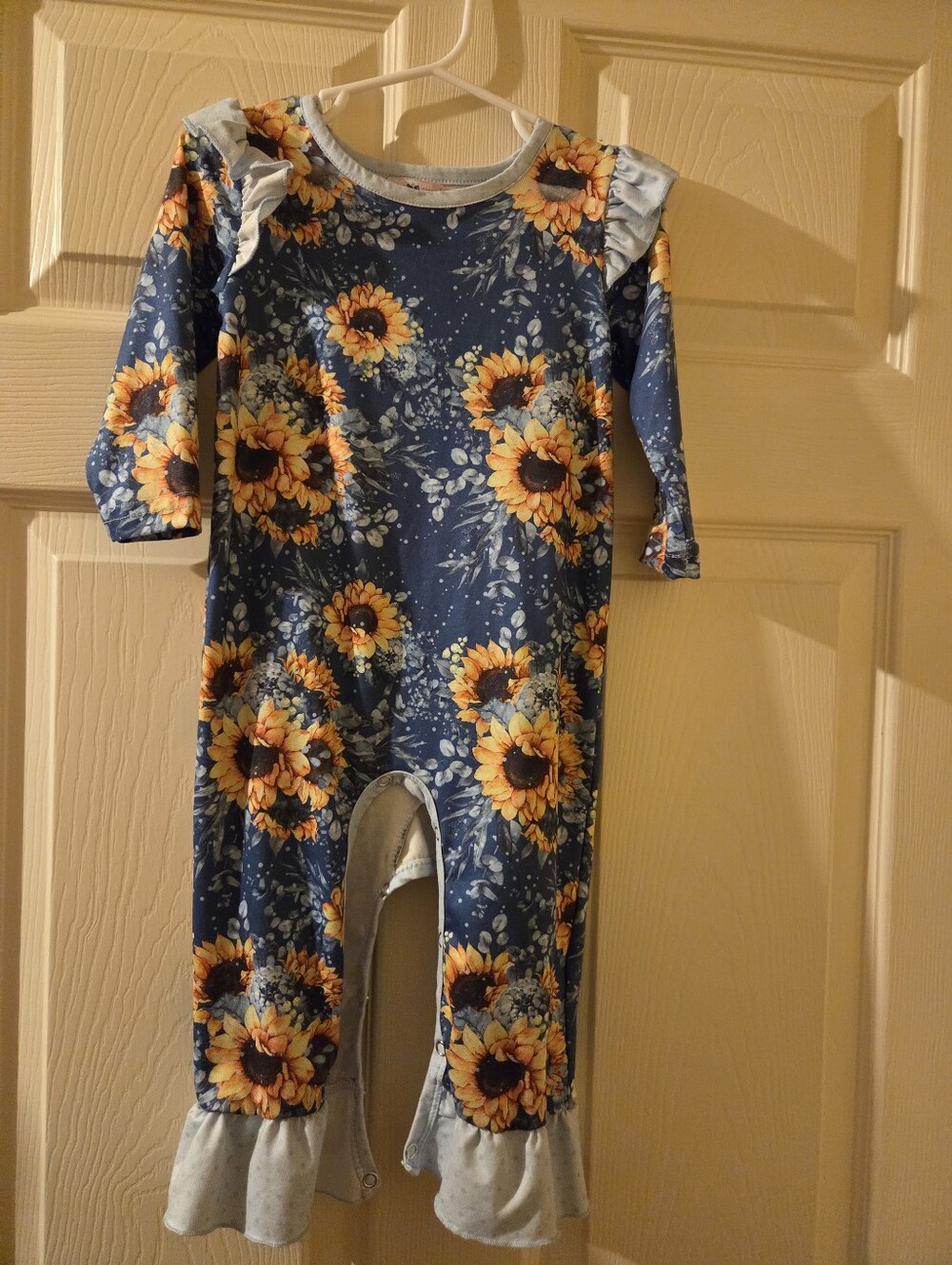 Pete + Lucy Sunflower Ruffle Kids One-Piece Footie - Navy